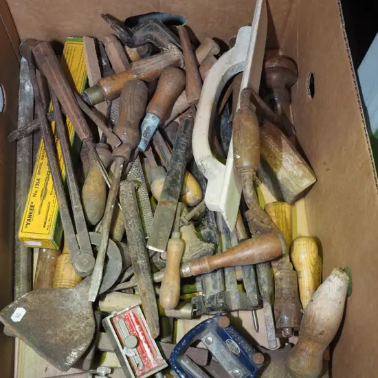 box of various vintage hand tools