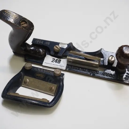 Record No. 735 combined hard and soft board plane, grooving attachment