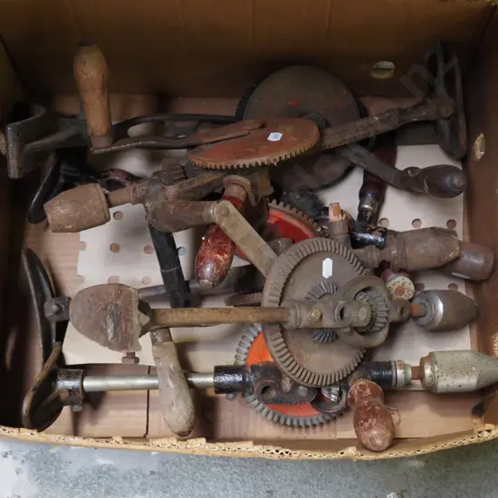 box of vintage rusty egg beater drills