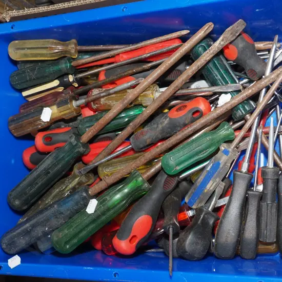 plastic tub of screwdrivers