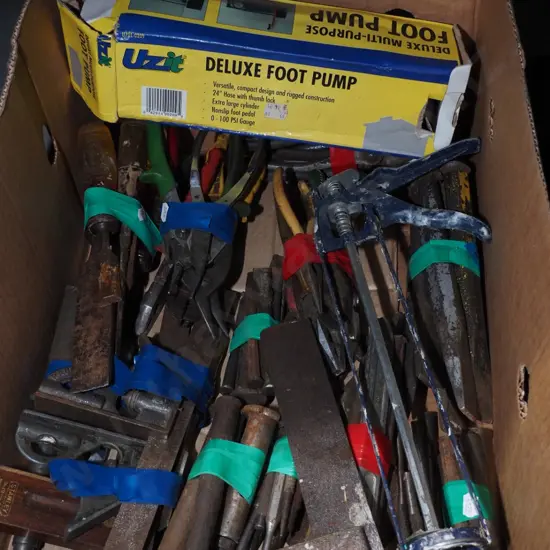 box; foot pump, caulking gun, builders squares etc