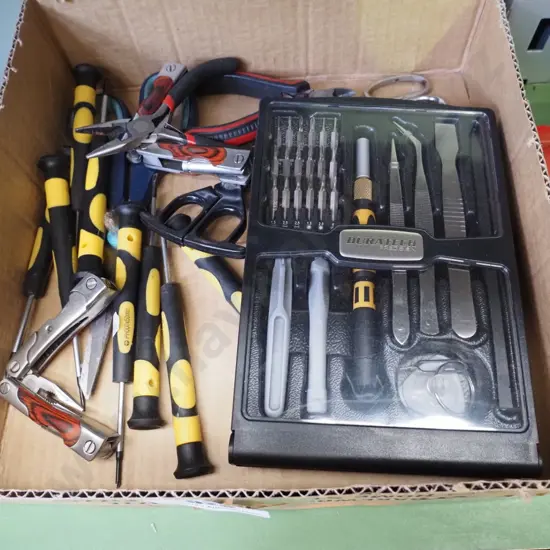 box; miniature screwdriver set, pliers etc