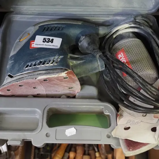 cased Ryobi orbital sander