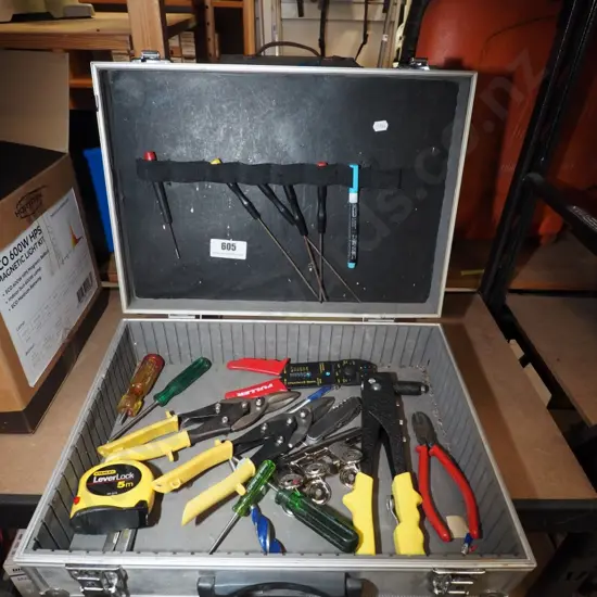 suitcase and contents, wire strippers, pot riveter etc