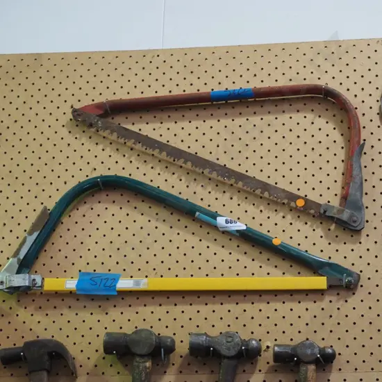 2 hand saws, hatchet