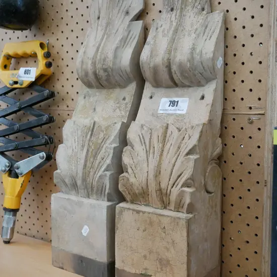 2 carved wooden architectural features