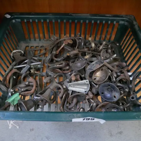 plastic tub of wardrobe hooks