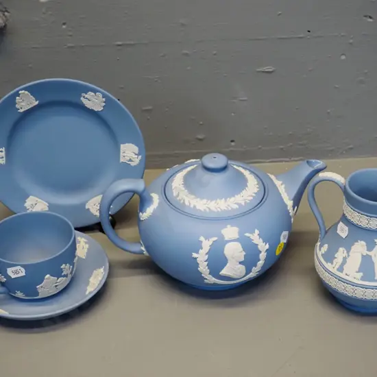 Wedgwood light blue jasperware: trio, jug, QEII commemorative teapot H-130 W-230