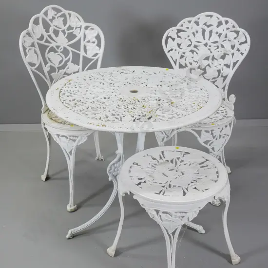 4 pieces vintage white painted cast aluminium outdoor furniture: table D700, stool, 2 chairs, some weathering