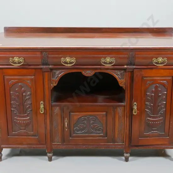 vintage dark stained kauri sideboard with 3 doors, 3 drawers, ornate brass drop handles, carved detail, some marks to
