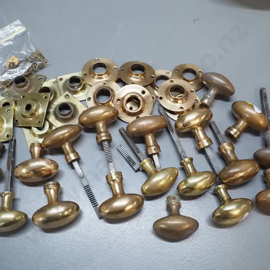 assorted vintage brass door knobs, stems, plates and screws