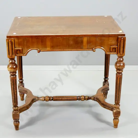 vintage mahogany occasional table w/ fluted legs, stretcher base, chip to veneer, hole drilled in one end, polish