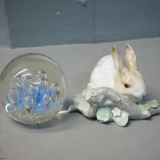 Lladro rabbit figure H80 L-110 and an art glass paperweight