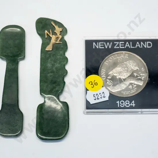 2 greenstone spoons, one with NZ map & a cased 1984 NZ Chatham Island robin dollar coin