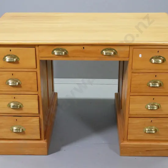 vintage kauri double pedestal 9-drawer desk, key escutcheons w/key, brass cup handles, minor scuffing H760 W1220 D770