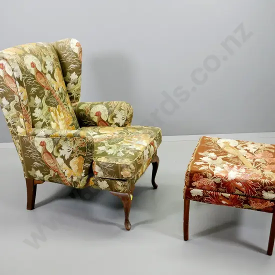 cab-leg wing-back armchair with tapered leg foot stool, upholstered in bird-pattern linen. Chair H-960 W-620 D-760