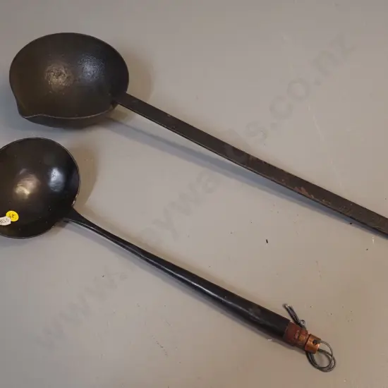 2 vintage cast iron ladles - longer is L-530 with pouring lip, other has wooden tip on handle
