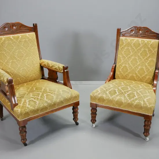 Edwardian matched lady's and gent's lounge chairs w/ nouveau style carved detail, covered in Italian embossed gold