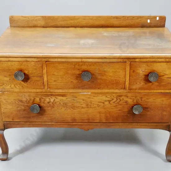 deco oak low 4-drawer chest w/brass floral handles, movement in joint on top, polish needs work H790 W1050 D500W