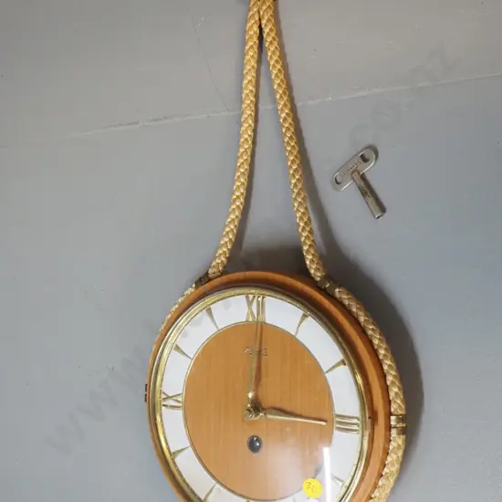 retro timber and brass Kienzle wall clock with key & corded hanger - some pitting to brass D-230