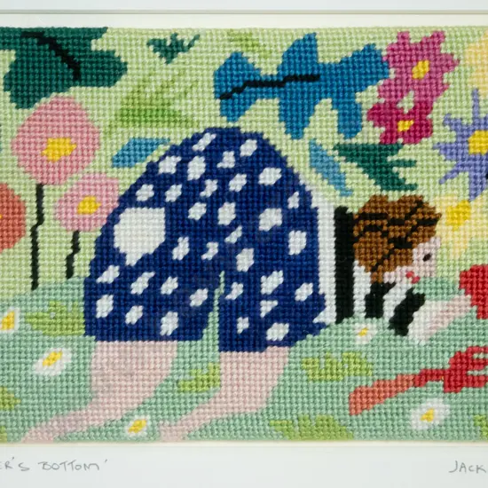 Jackie Rainey '94 - framed needlework "A Gardener's Bottom" H-150 W-110