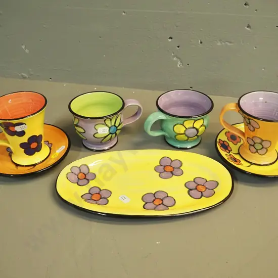 Lynne  Berland NZ pottery items - 2 cups & saucers and 2 cups on saucer/dish L-260 W150