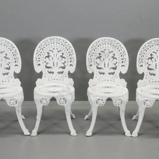 set of 4 Victorian style cast aluminium outdoor dining chairs - some loss to white paint finish H850 W410 D480