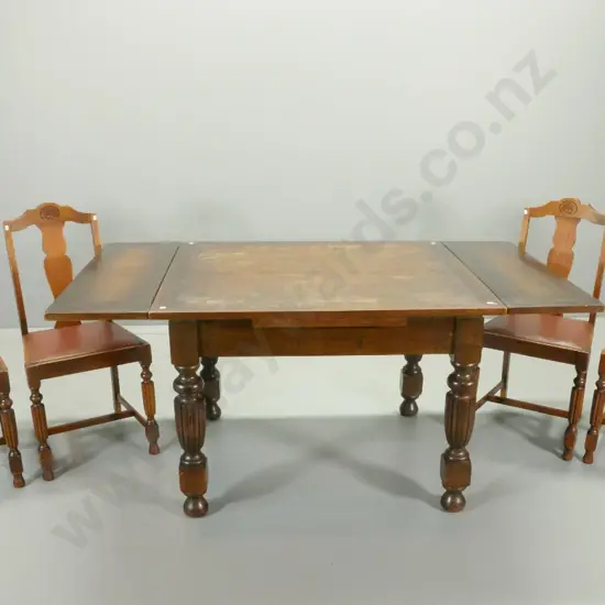 Edwardian end-leaf extending dining table and 4 chairs, fluted legs, leatherette & carved back chairs, polish needs work