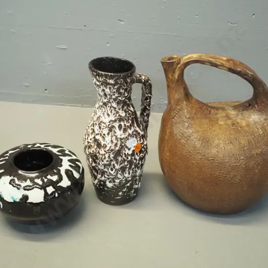 studio pottery items: coarse textured brown ewer jug H230, black & white bowl (unknown mark) & German pottery vase