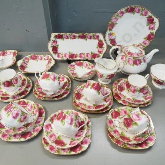 Royal Albert Old English Roses teaware including teapot, cream & sugar, 7 trios serving dishes, etc.