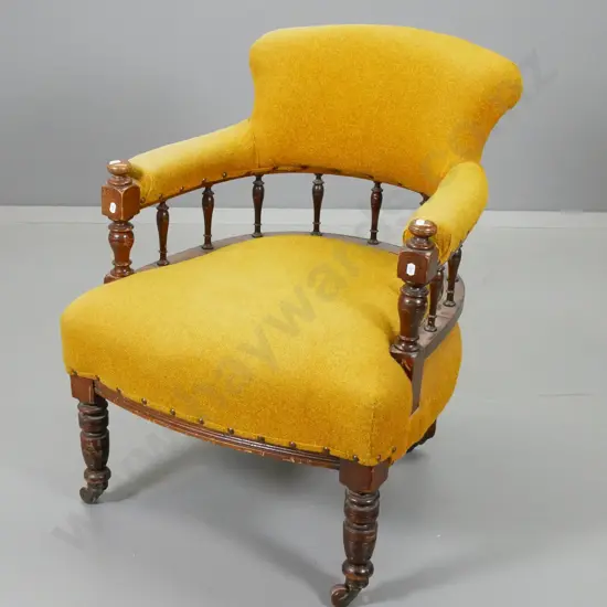 vintage mahogany tub chair with spindles and original porcelain casters, in gold tweed fabric H800 W610 D620