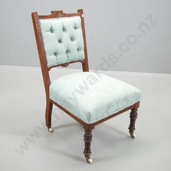 Edwardian nursing chair with show-wood frame on original porcelain casters, light blue damask fabric