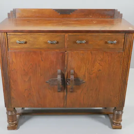 deco oak sideboard  2-door w/wooden handles, 2 drawer, stretcher base, escutcheon and key - polish needs attention