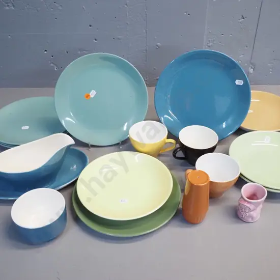 assorted Crown Lynn colour glaze items including luncheon plates, cups, gravy boat & saucer, etc plus child's egg cup