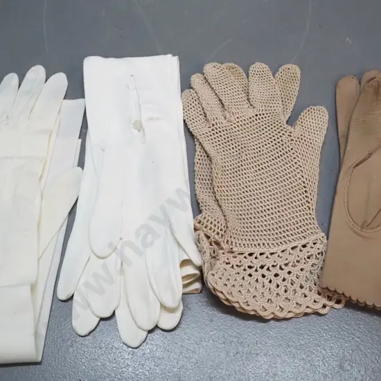 4 pairs woman's gloves - 2 pairs long evening gloves, one crochet and one soft leather