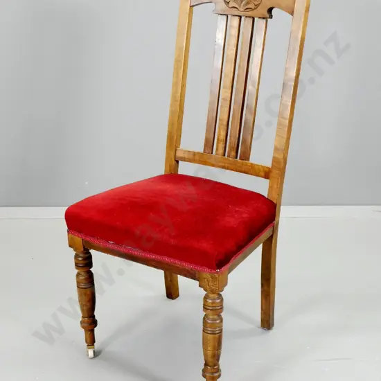 Edwardian mixed timber high-back dining chair w/ carved top rail, original casters, red velvet seat - loose joints in