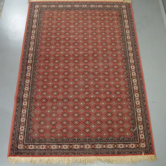 Persian style wool floor rug - light reds and beige - L2380 W1700