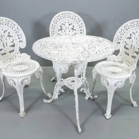 white painted cast alloy patio table and 3 chairs - paint needs some attention H-700 D-690
