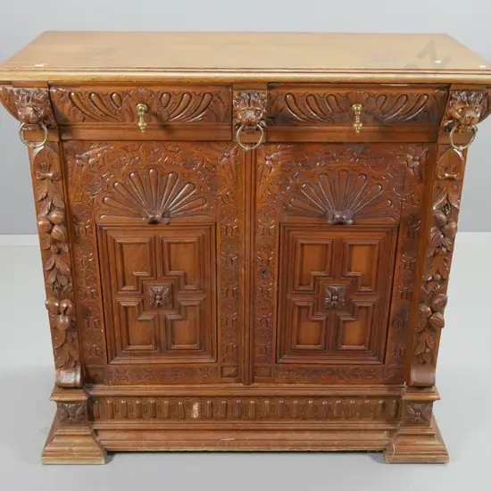 vintage French oak heavily carved sideboard, lion's head ornaments w/ metal drop rings, 2 doors w/key H1030 W1080 D520