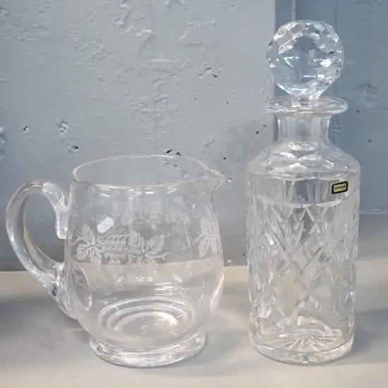 Webb Corbett cut crystal "Georgian" pattern stoppered decanter H270 and a grape motif etched crystal jug