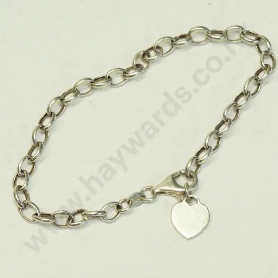 silver bracelet with heart charm stamped 925