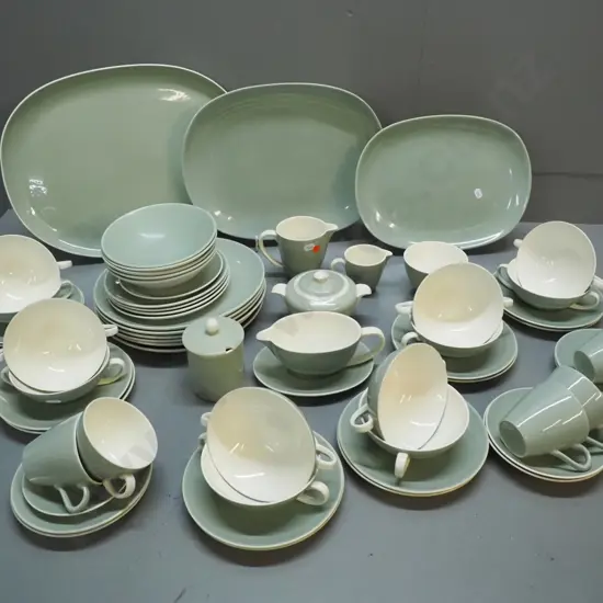 large collection of Poole celandine dinner and tea ware including 3 platters, jugs, soup bowls, etc - small chip to one