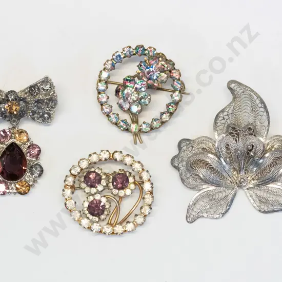 4 costume brooches