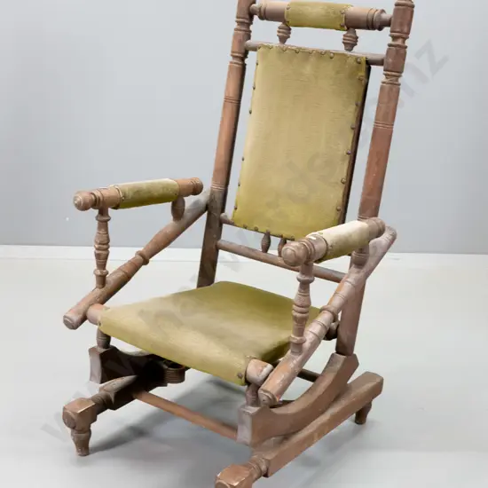 cotton-reel Dexter rocking chair - some fading to green velvet, finish needs attention H1050 W570 D600