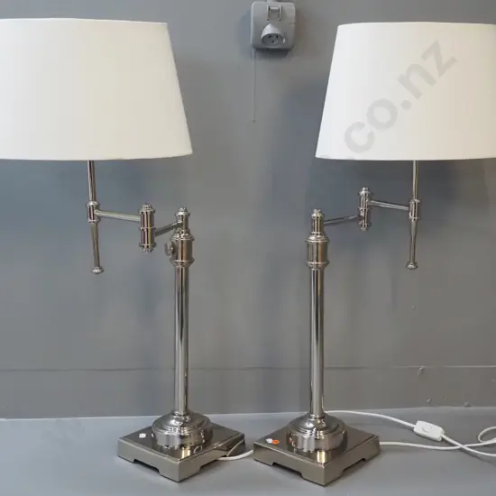 pair of tall chrome articulated swing-stem table lamps with oval shades H-780 Base 170 x 170