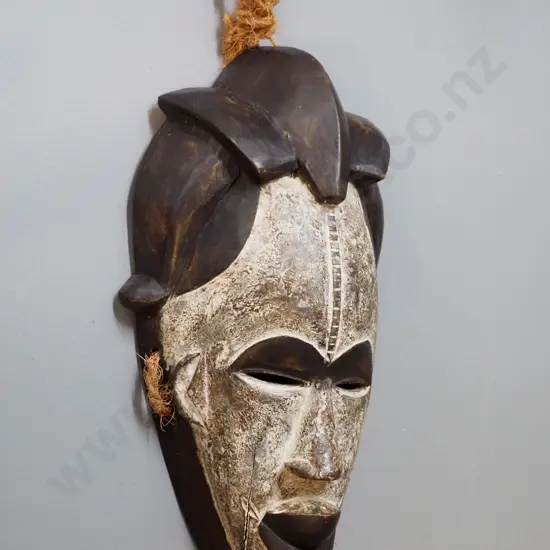 carved and painted wood wall mask with rope hanger H340 W200