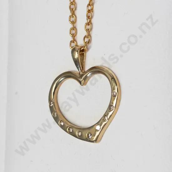 rolled gold heart shape necklace