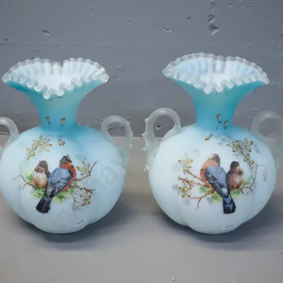 pair of frosted blue glass handled vases with frilled rims and bird motif decoration H-200 W-180