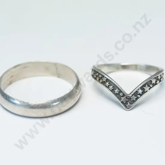 2 silver rings both stamped 925