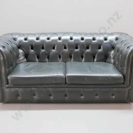 deep-button studded very dark green leather 2-seater chesterfield with loose seat cushions H-750 W-1830 D-820